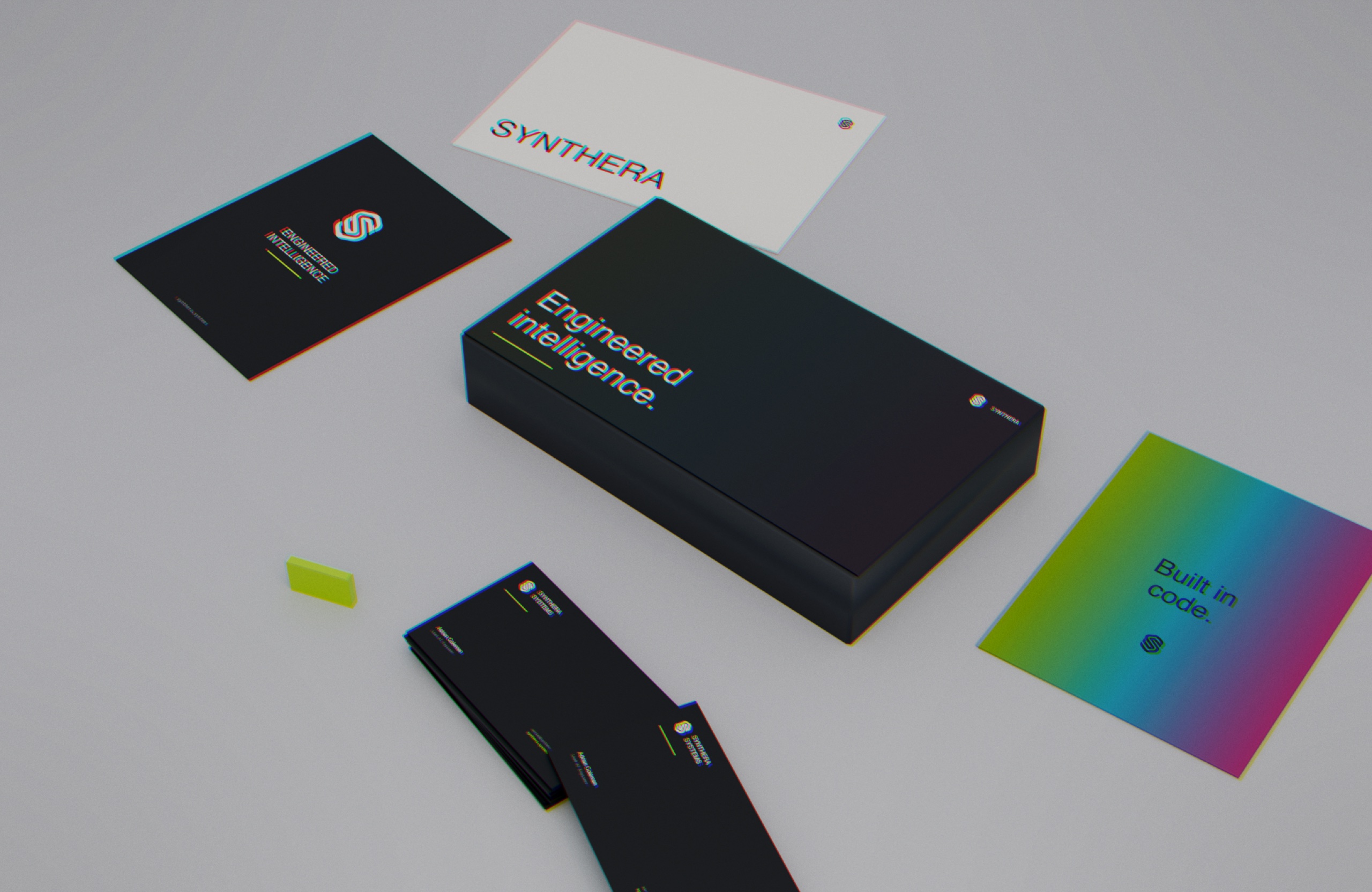 Synthera stationery flat-lay — presentation box, business cards, gradient card and swag